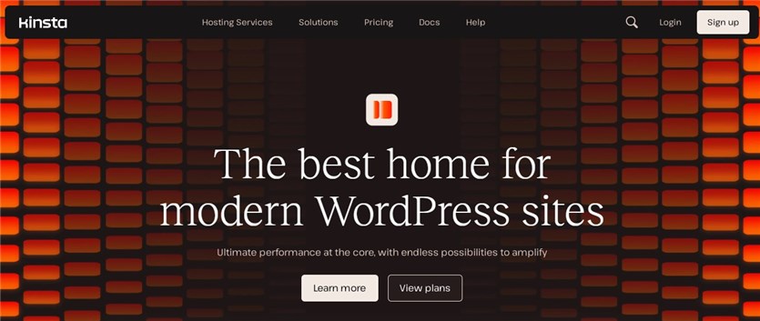 Screenshot of the Kinsta web hosting homepage in orange and black colors.