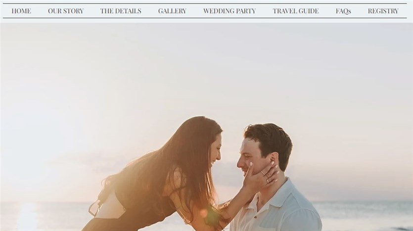 Screenshot of the Alex and Bailey homepage with menu at the top of the best wedding website example.