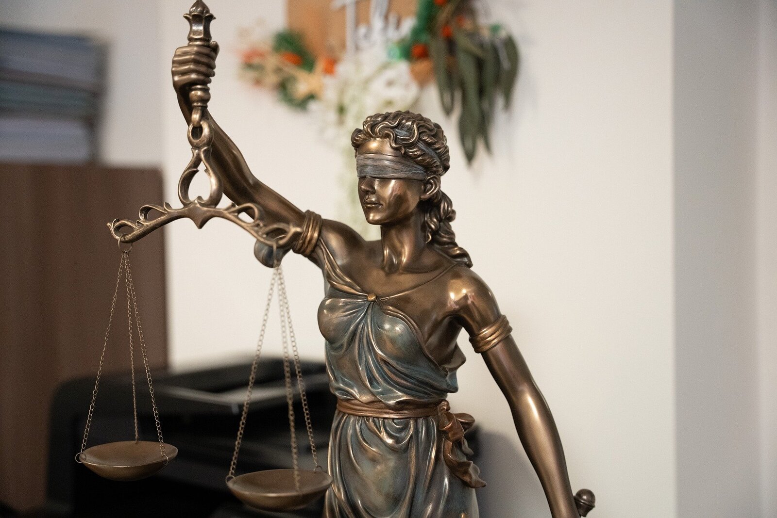 Graphic of Lady Justice as a personification of moral force in judicial systems.