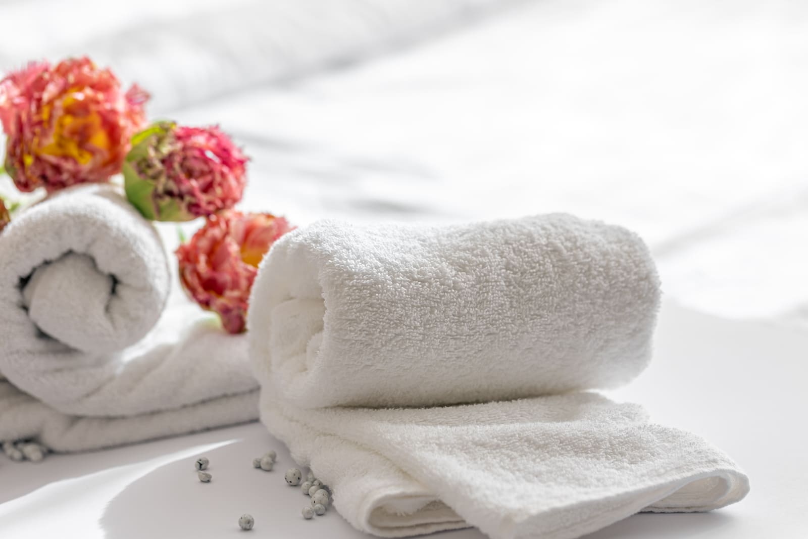 Photograph of towels, a popular amenity available at various hotels.