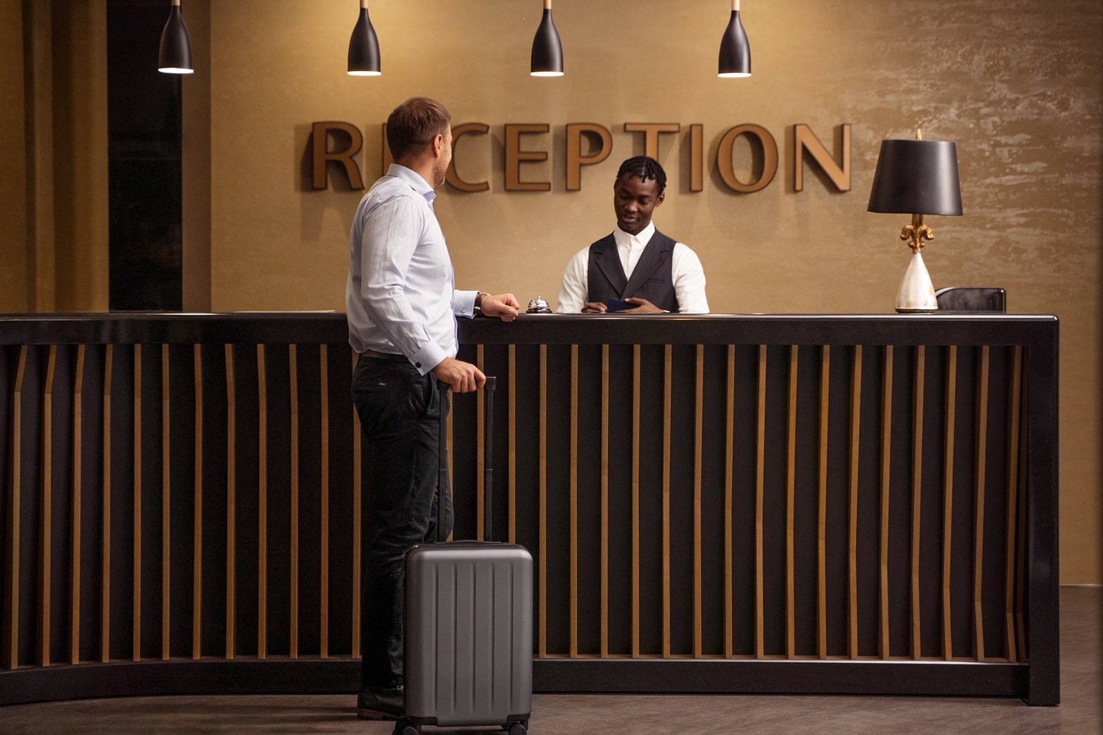 Graphic of hotel reception during a check-in.