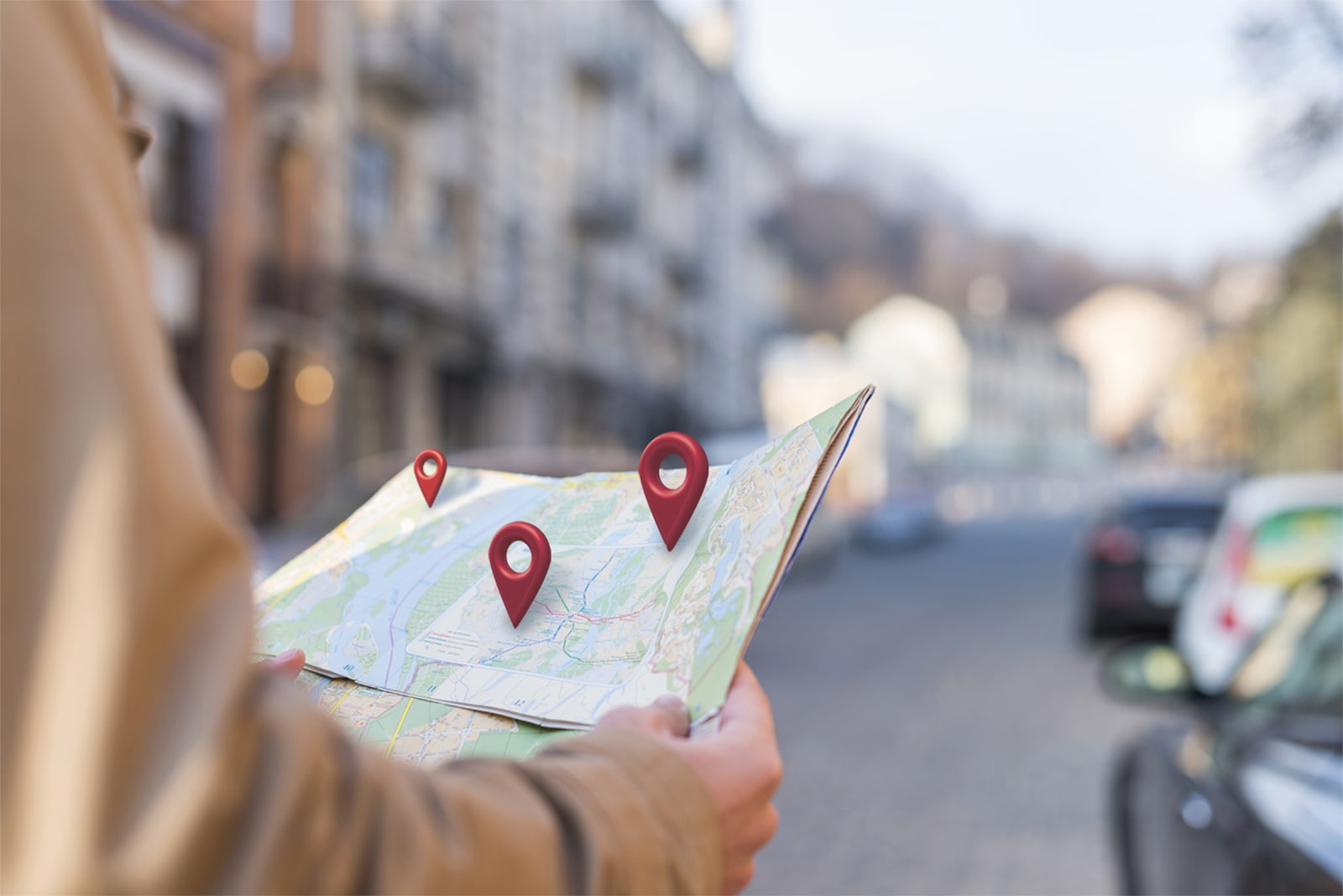 Visual of a person using a map with Google Maps markers to find a campground.