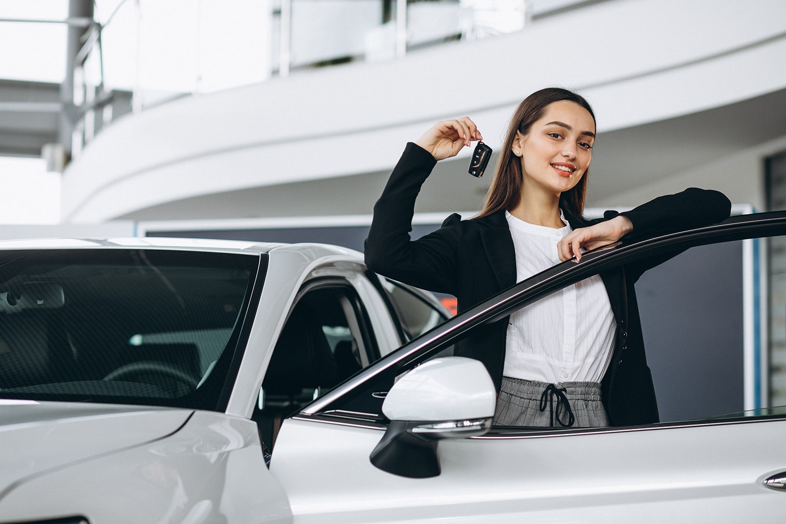 Snapshot of a woman renting out a car.