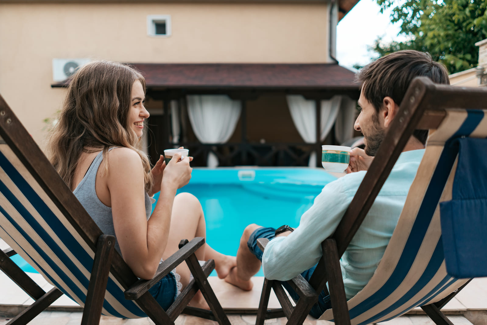 Representation of two people enjoying their stay after booking vacation rental services.