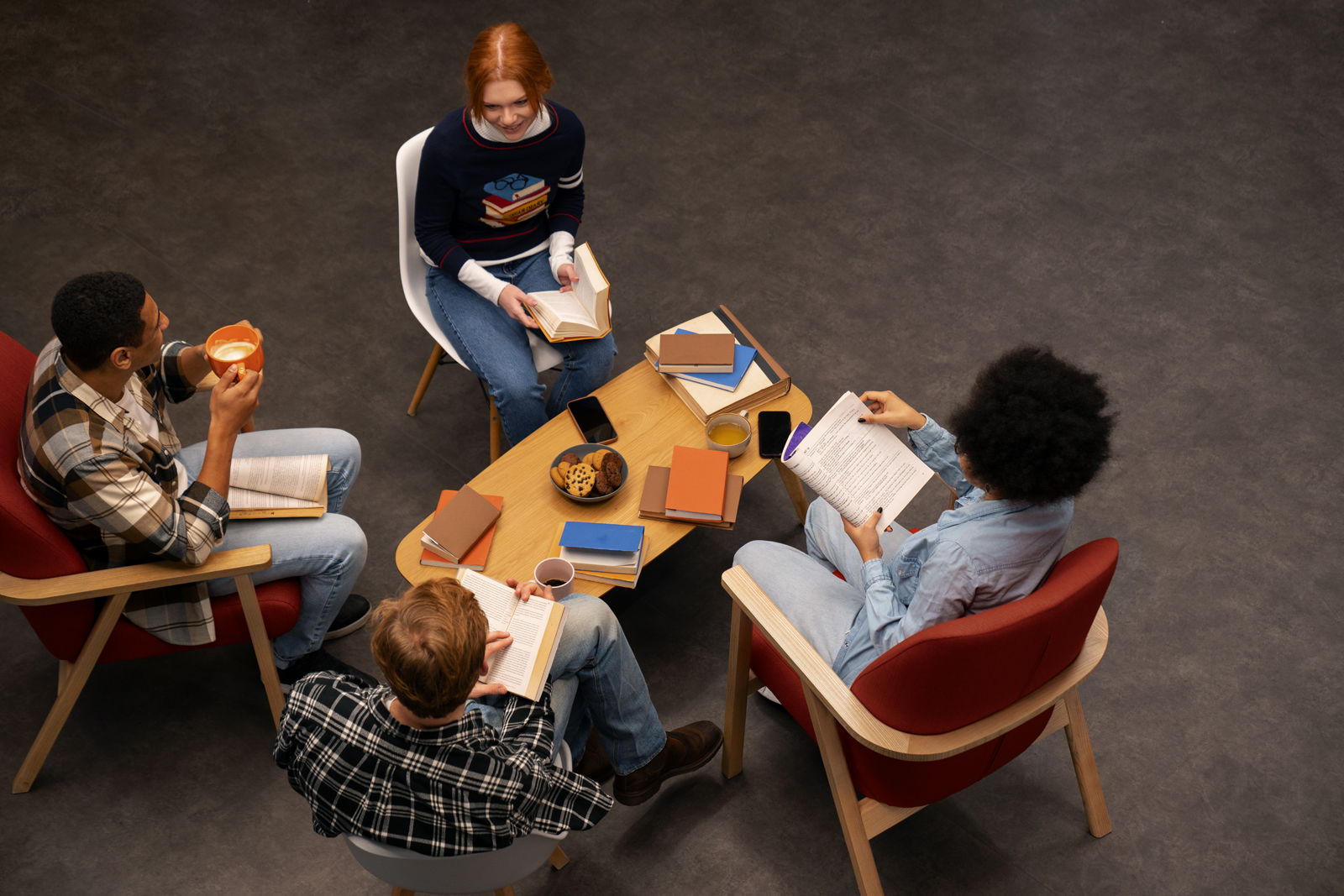 Photograph of a small group of people studying.