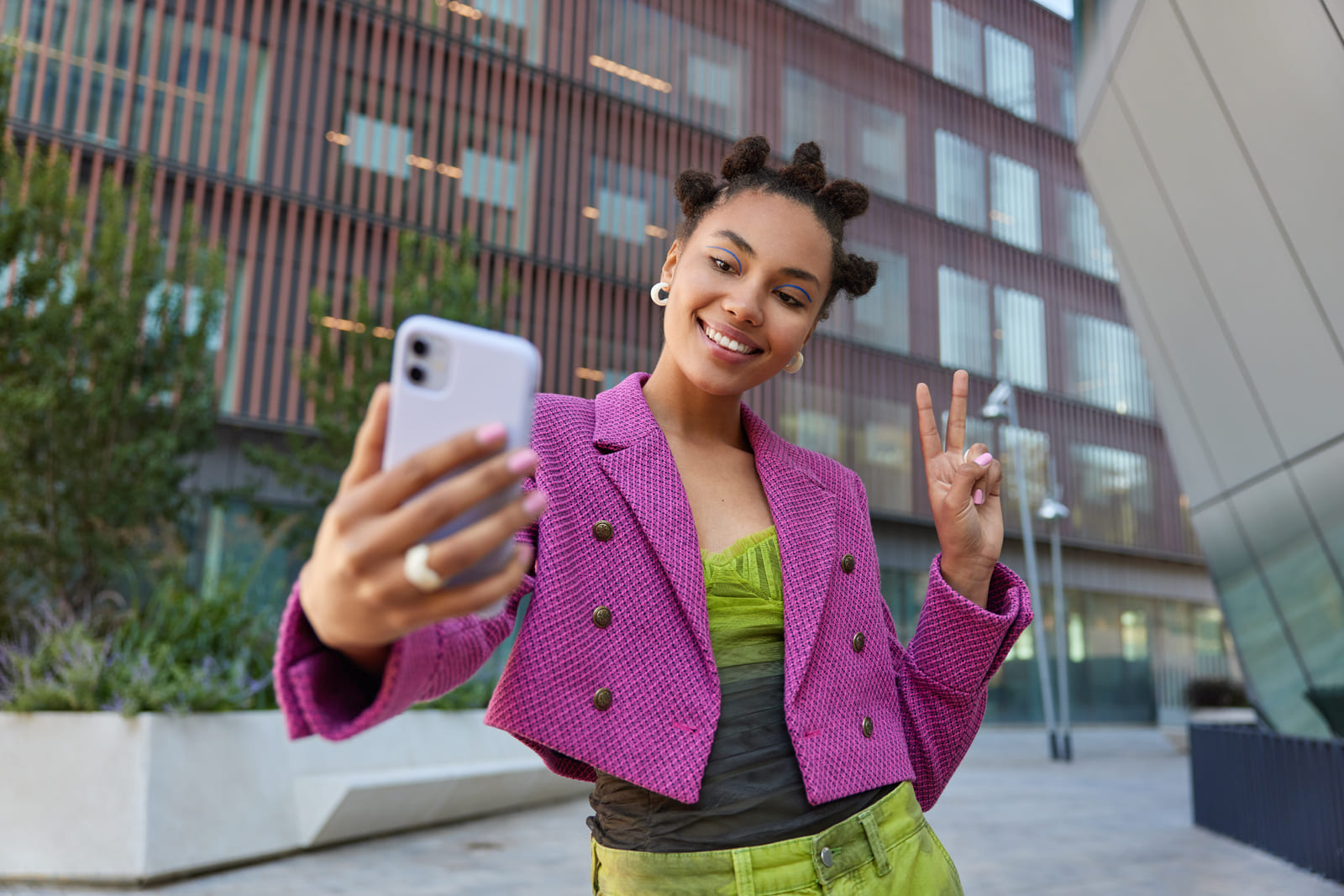 Representation of an influencer posting content to use for virtual event marketing.